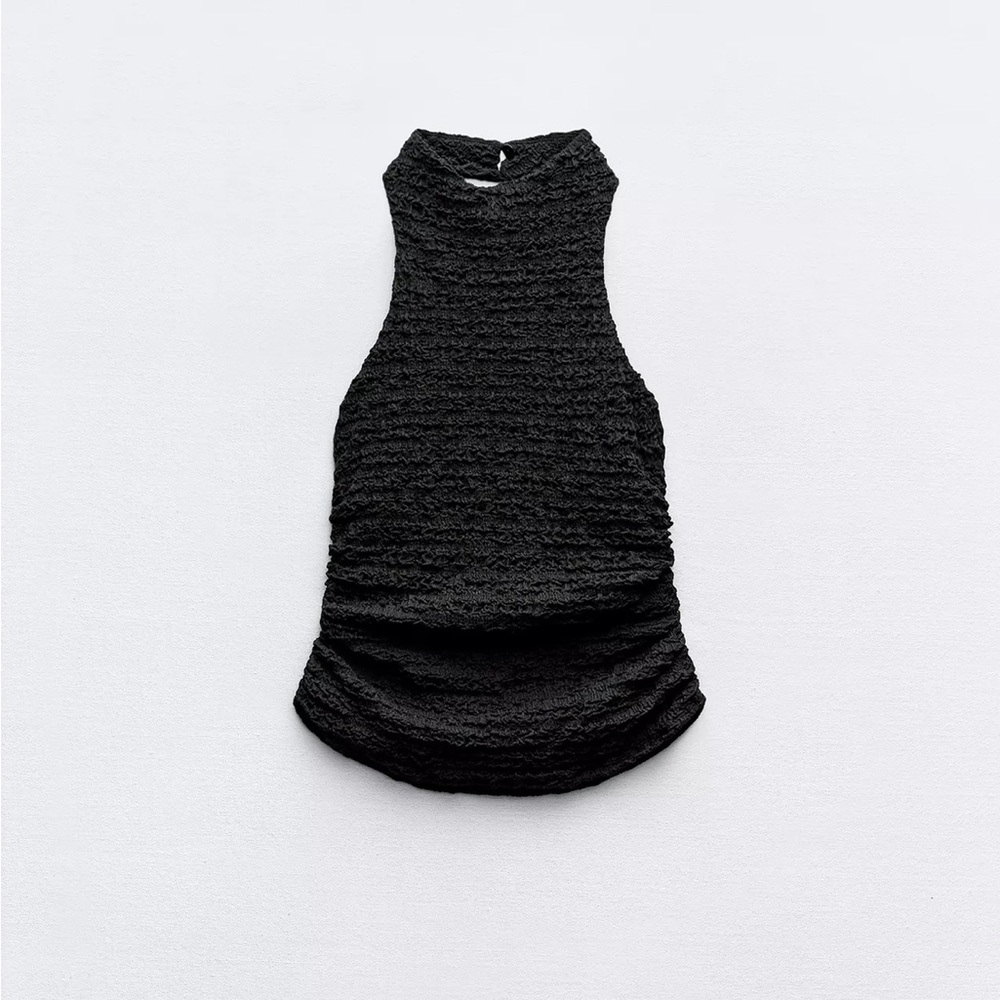 Zara Black textured halter neck top, button closure around the neck. Size small.